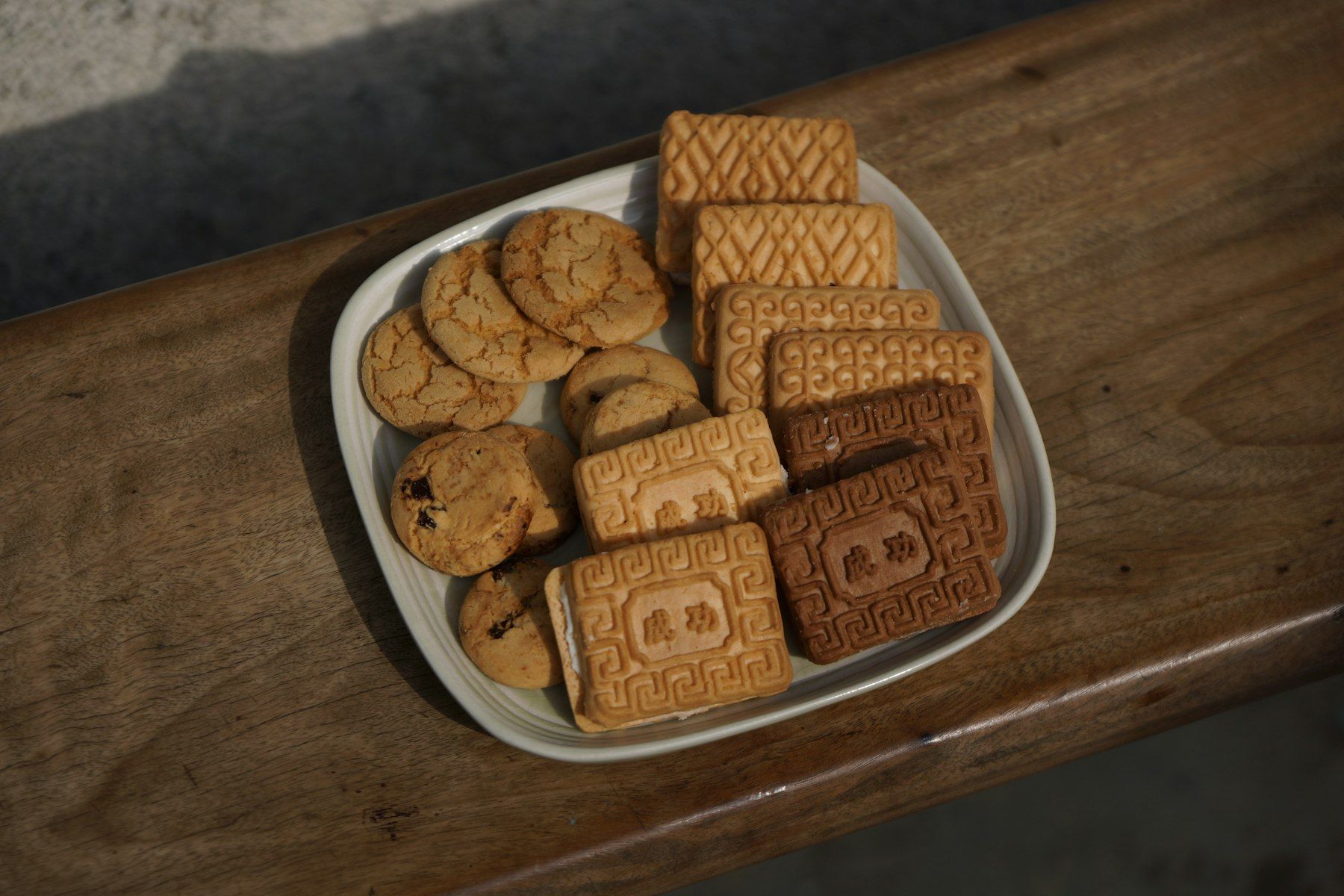 A plate of cookies and cookies on a table