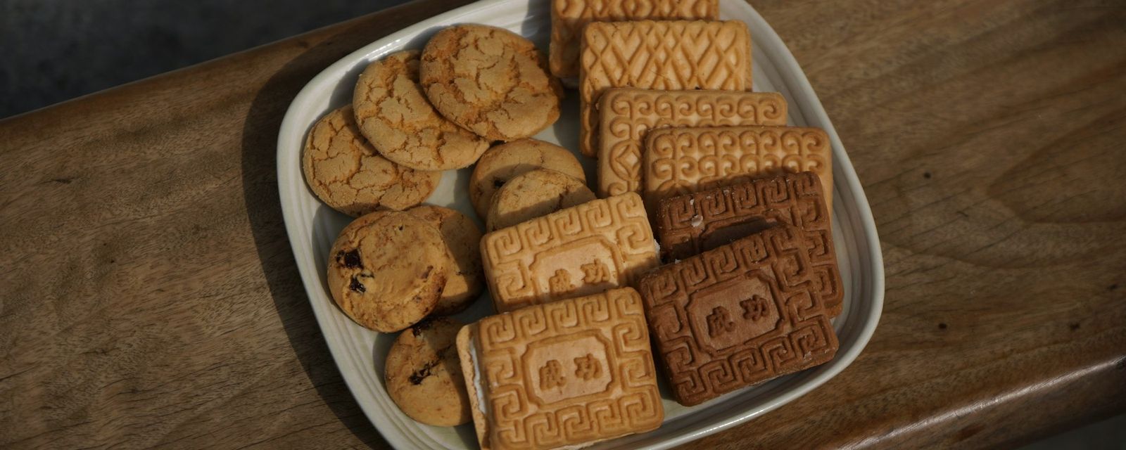 A plate of cookies and cookies on a table