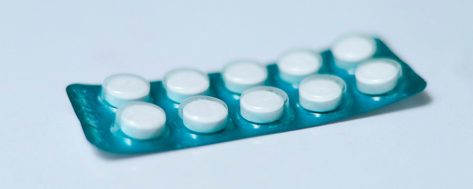 A close up of a contraption on a white surface