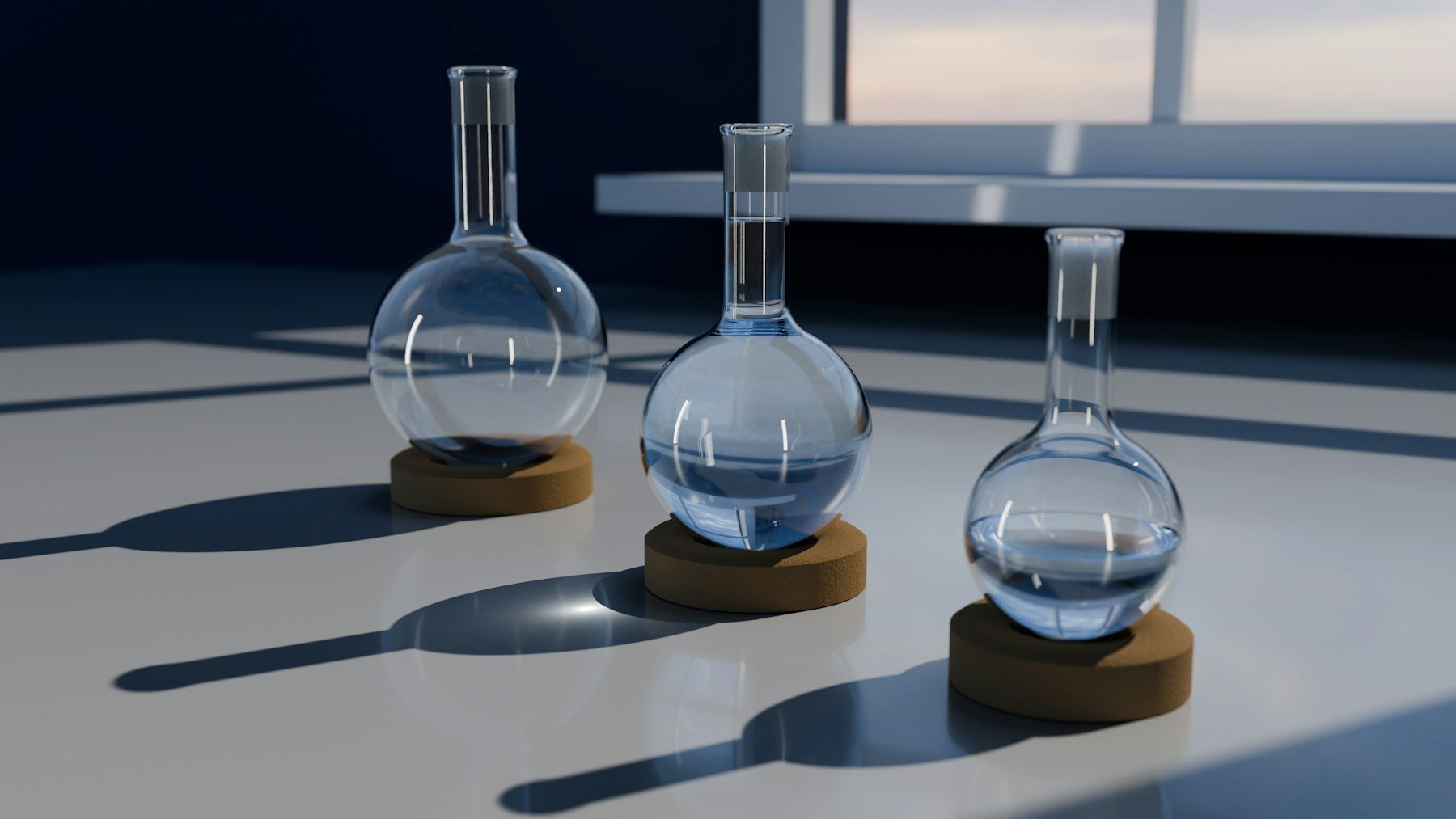 A 3D render of three glass round-bottom flasks on cork stands on a white surface