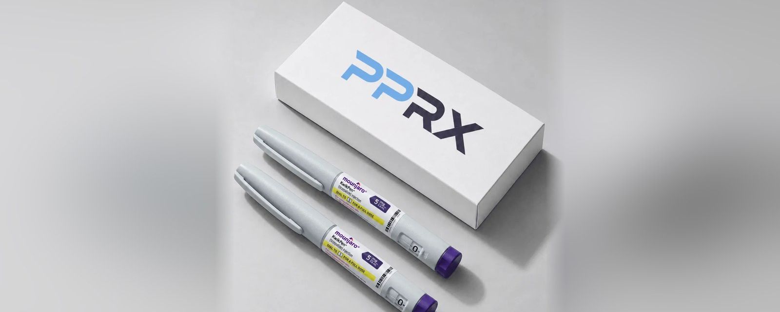 PPRX box with two Mounjaro 5mg pens on a grey studio background