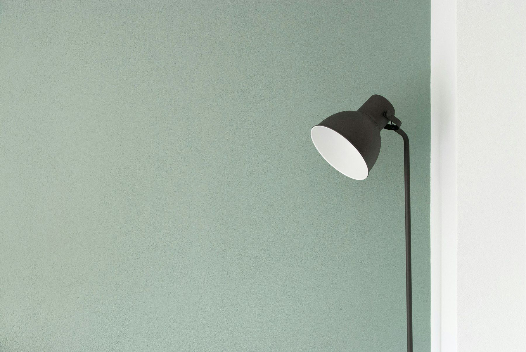 Black floor lamp at the corner