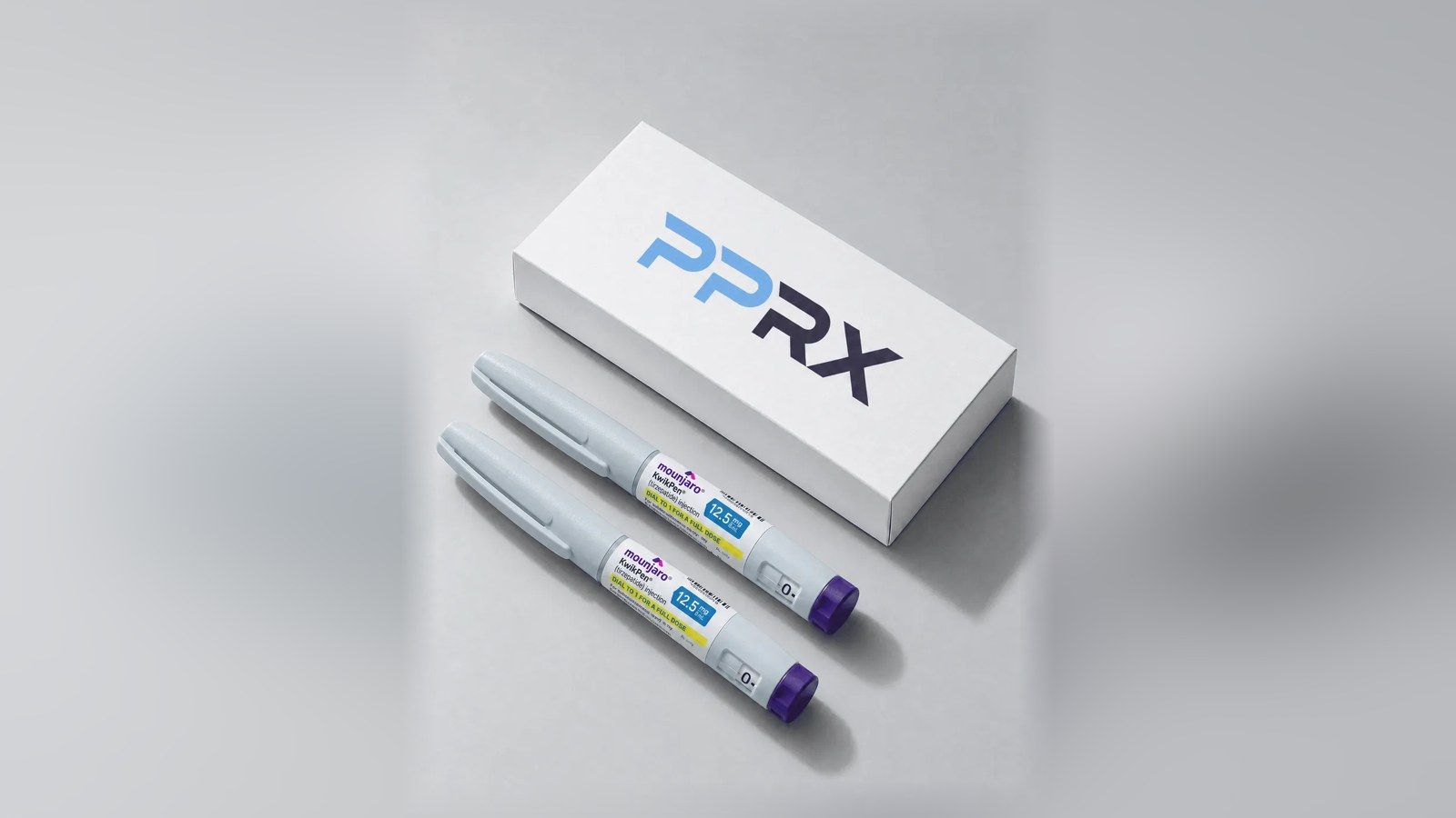 PPRX box with two Mounjaro 12.5mg pens on a grey studio background