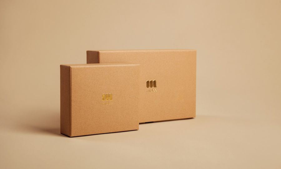 Brown cardboard box on white table
