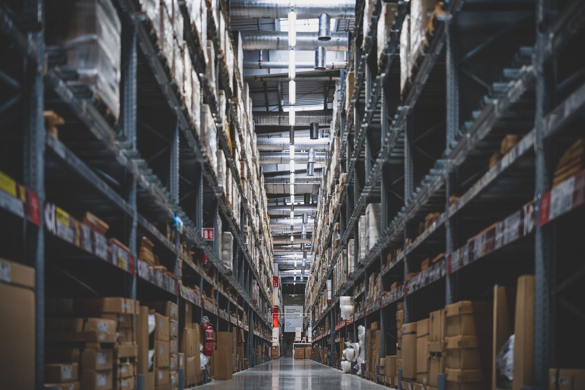 A warehouse with high shelves