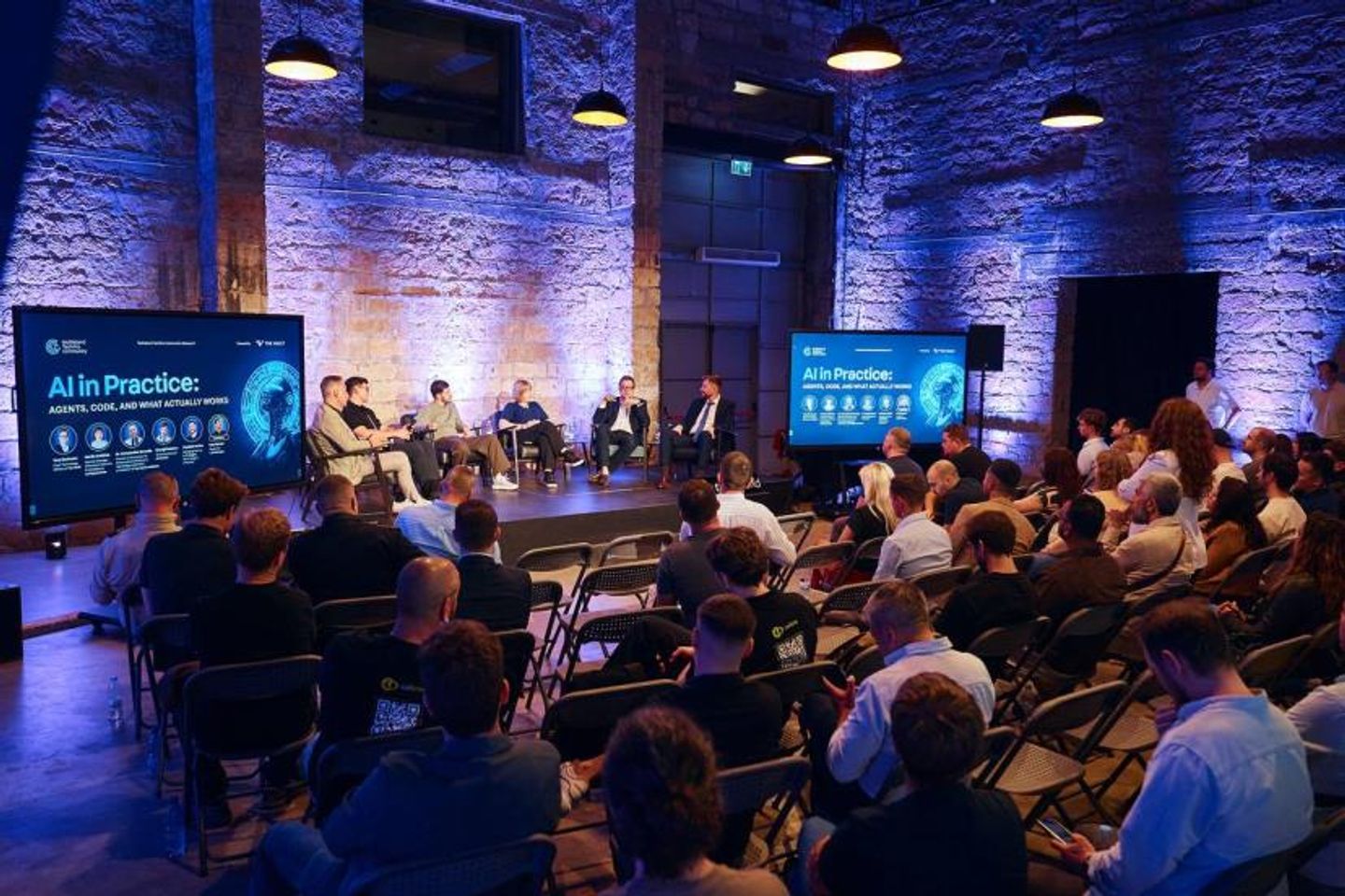 Panel discussion on AI in Practice at a TechIsland community event
