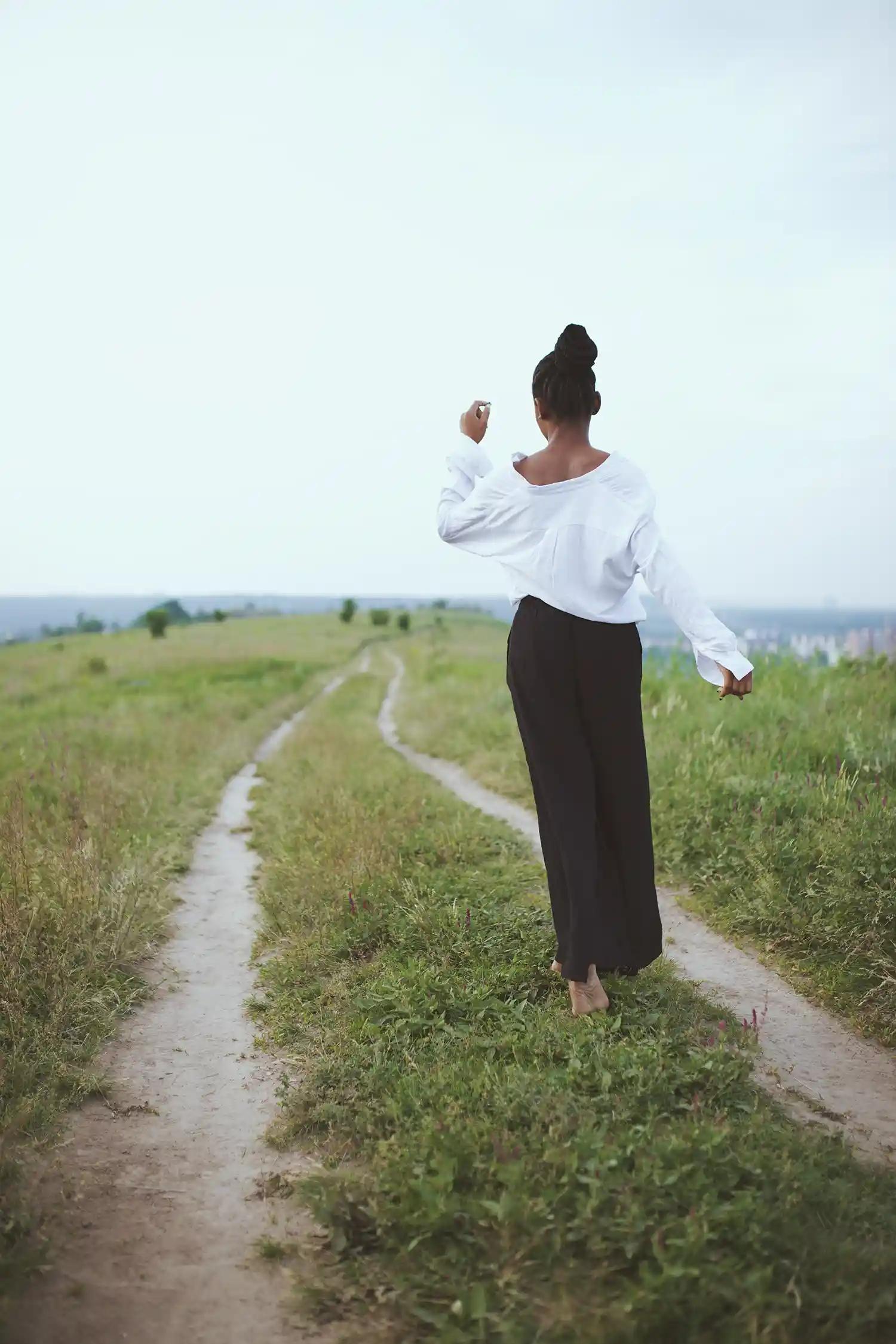 person walking in nature