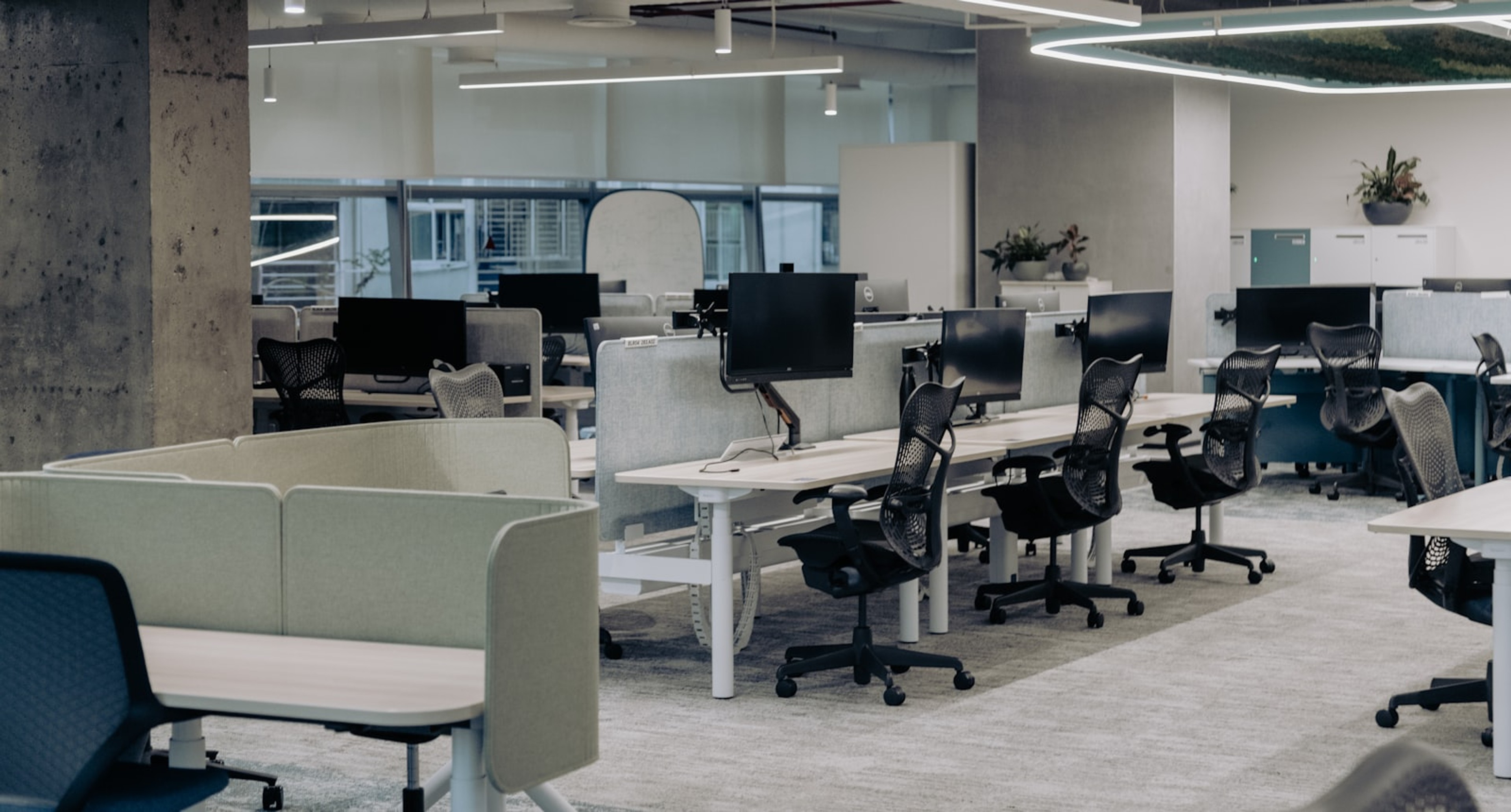 Bright open-plan office with a glazed facade