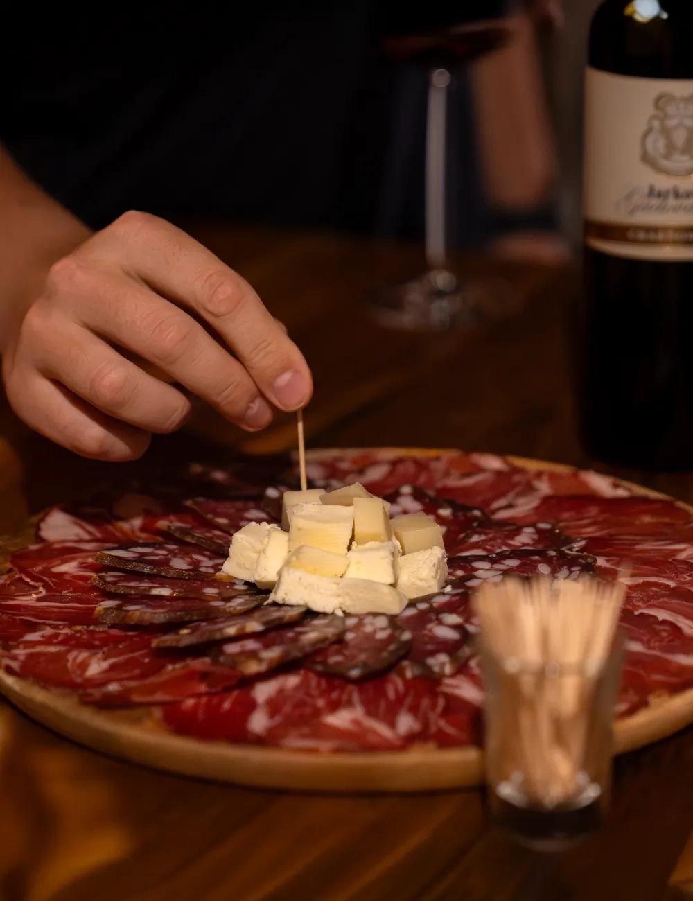 Home-cured prosciutto and cheese served with a Jarkovič wine tasting