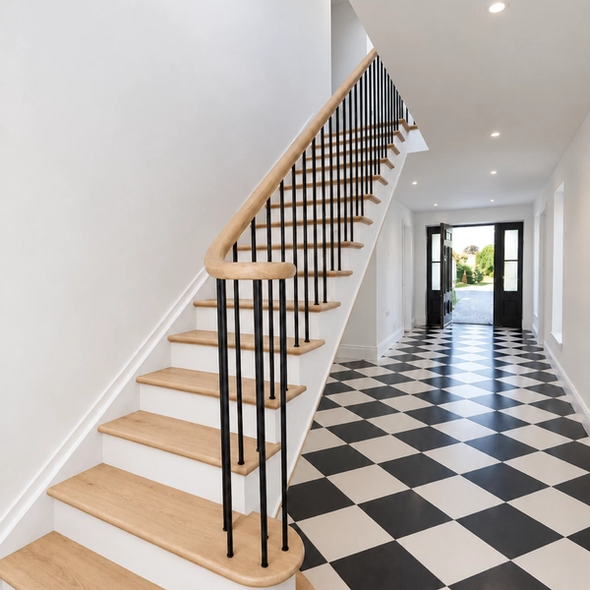 Softwood cutstring with oak treads and continuos handrail, powdered coated solid steel spindles