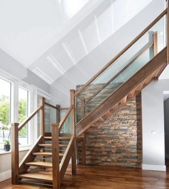 Walnut Open Riser With Stainless Steel Bars And Glass Banister. Rectangle 235