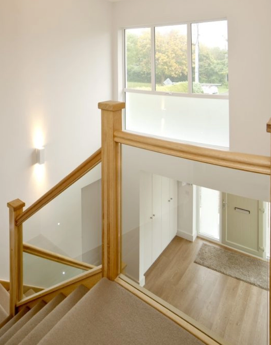 closed riser glass stairs