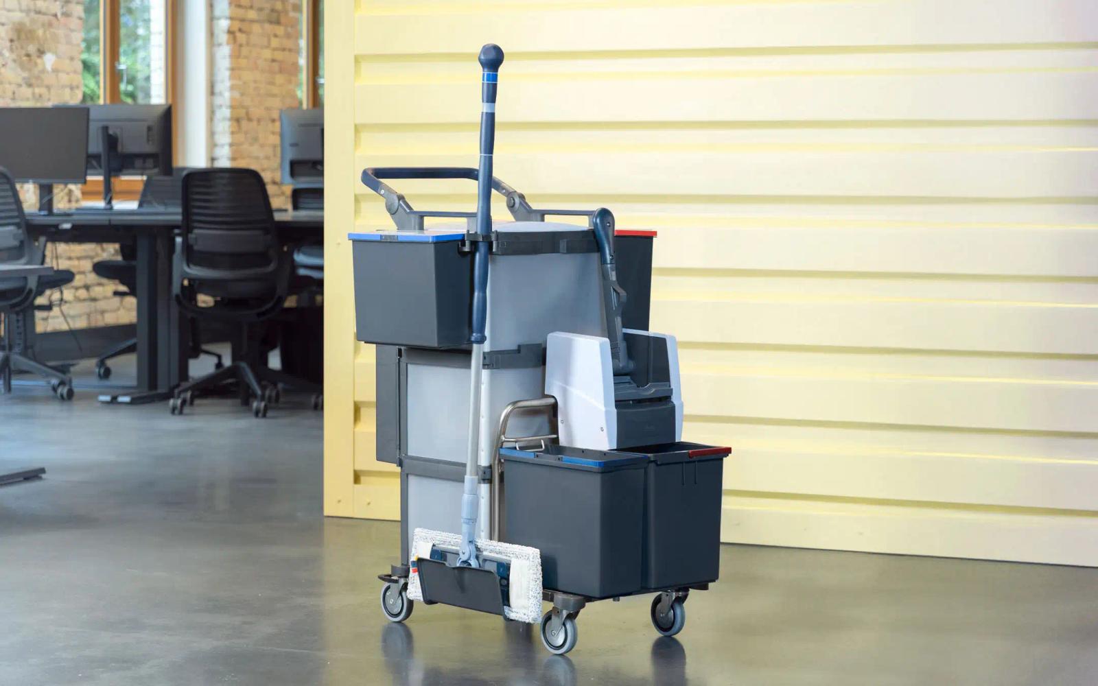 Compact Shopster trolley parked in an open-plan office, taking up barely any floor space