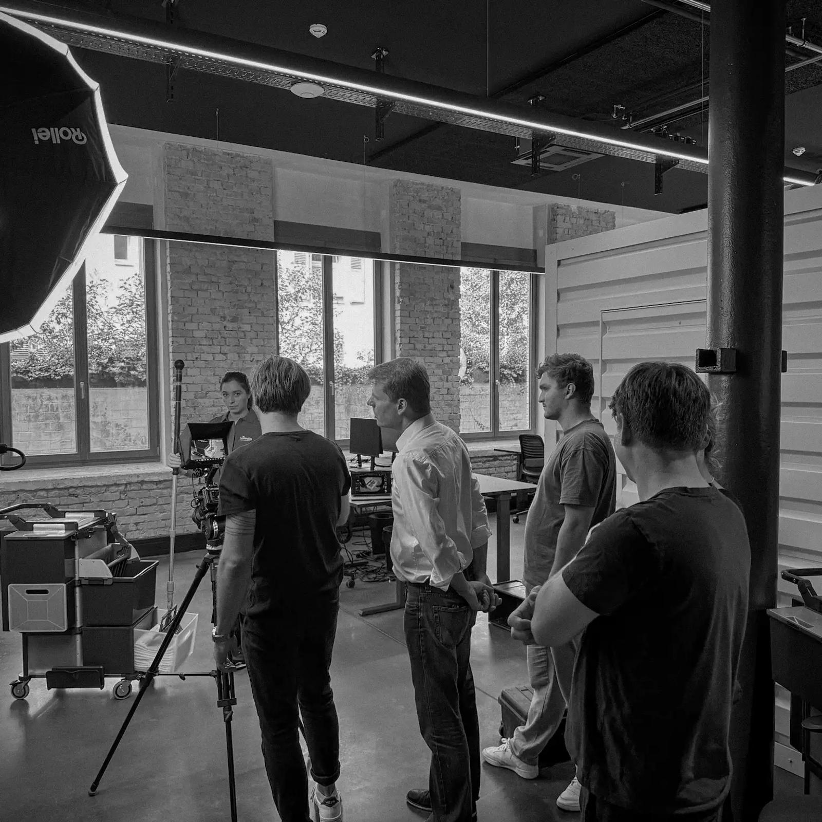 Behind the scenes: the film crew setting up a lighting shot