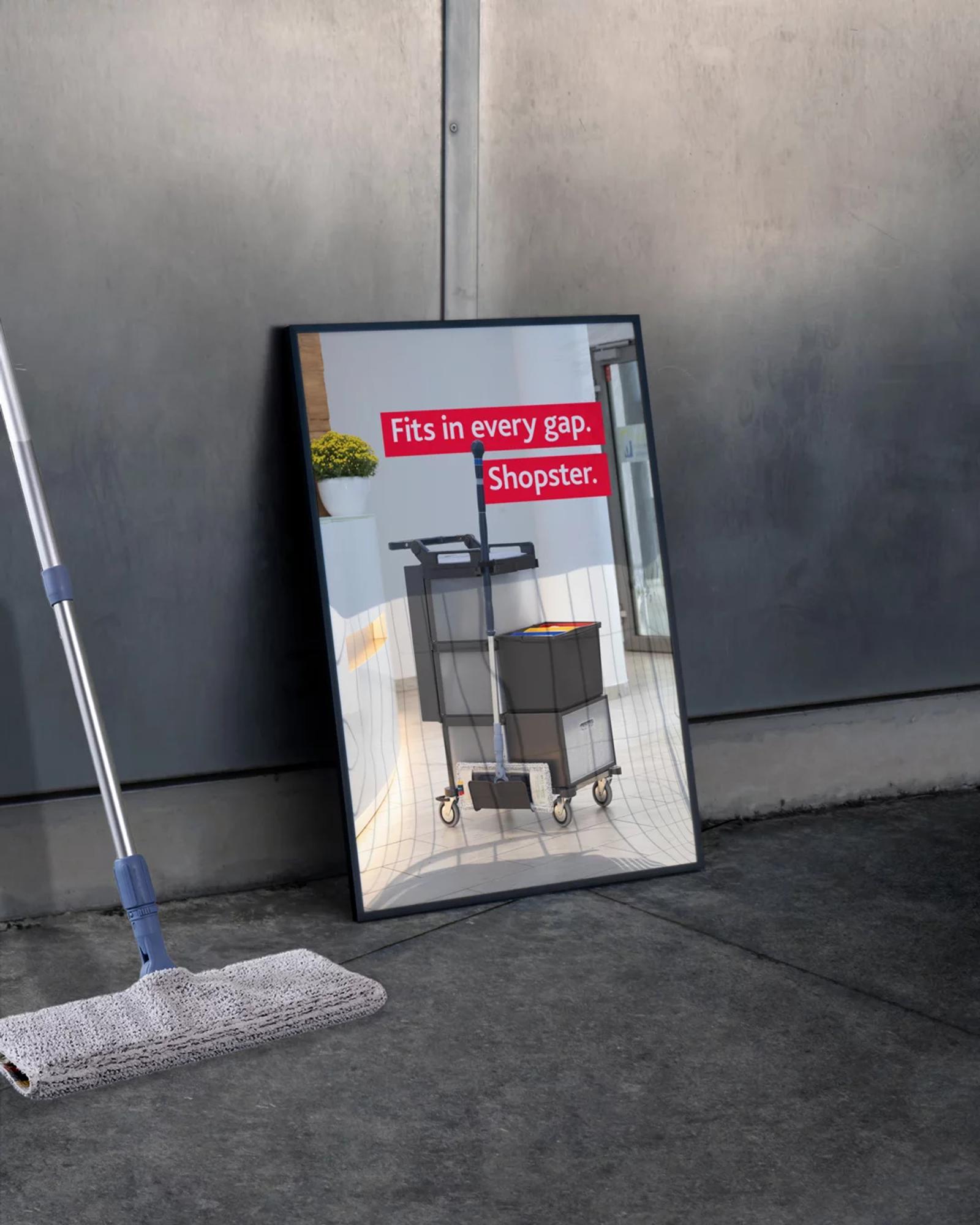 Out-of-home poster of Shopster in a narrow corridor with the line “Fits in every gap. Shopster.”