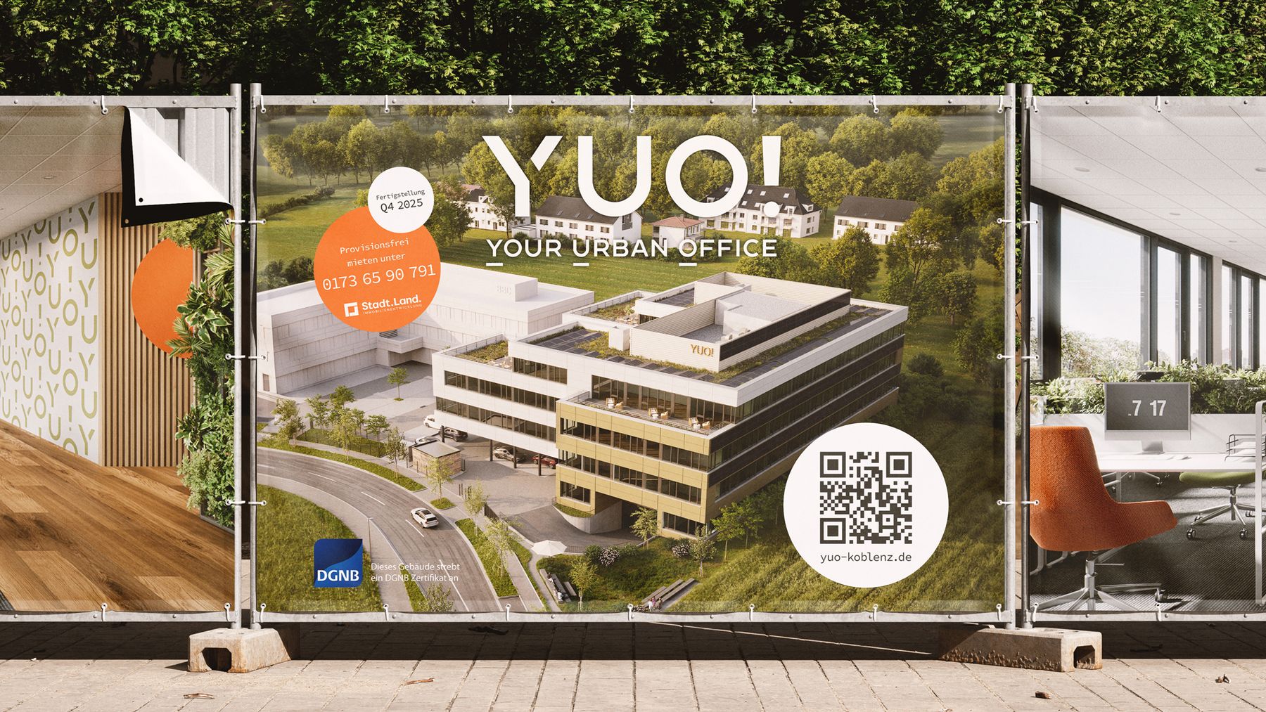Construction-fence banner reading “YUO! Your Urban Office” in front of the development