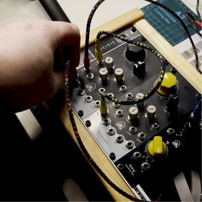 Komodular modules patched in a Eurorack case
