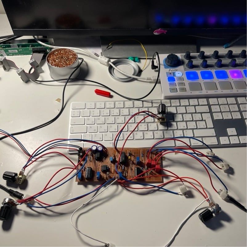 VCO prototype on a veroboard with patch wires on the workbench