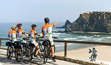 A local bike guide explaining to the tour about Atlantic coast