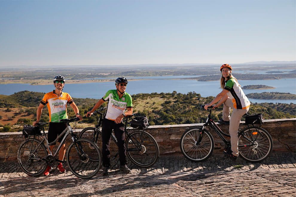 a group of cyclists in Monsaraz, Alentejo at Alqueva lake
