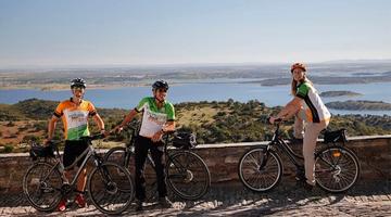 a group of cyclists in Monsaraz, Alentejo at Alqueva lake