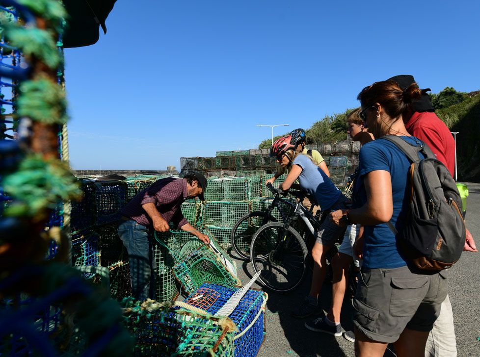 Along the coast bike tour - local fishermen