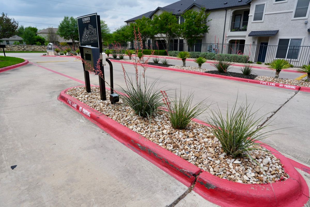 Gated Drive-Thru Entry Landscaping | Hutto, TX Commercial Landscaping