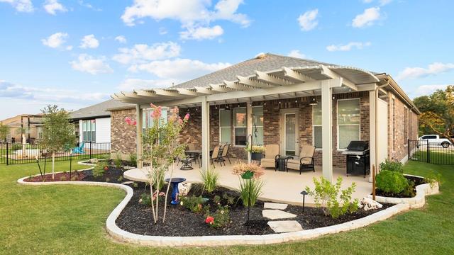 Backyard Pergola & Flower Beds
