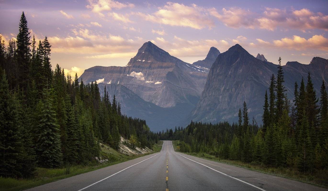 The Icefields Parkway winding between mountain ranges