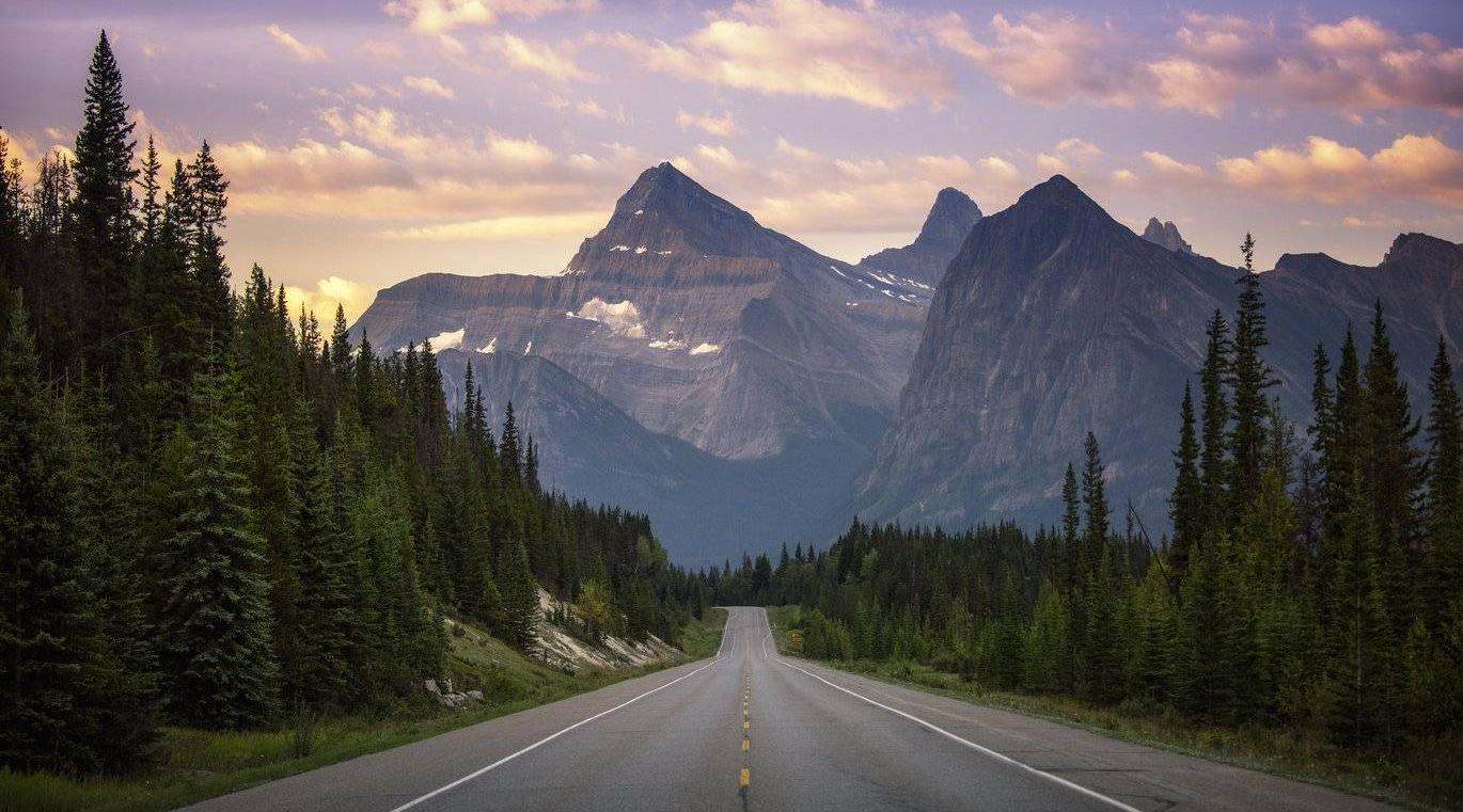 The Icefields Parkway winding between mountain ranges