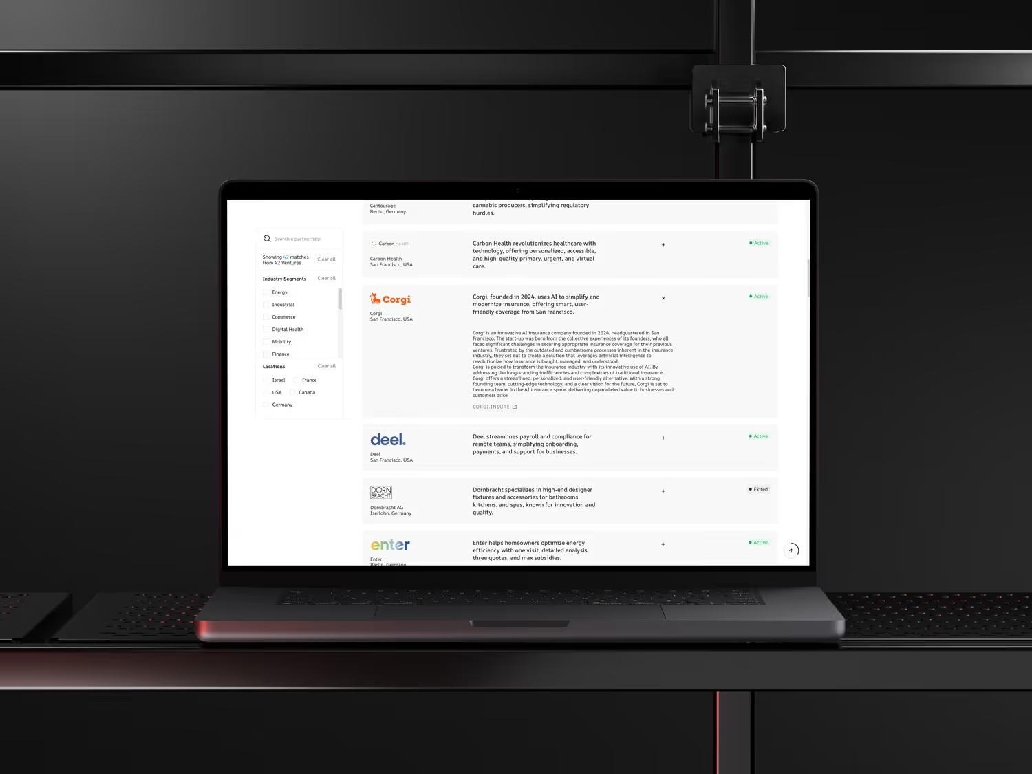 Page portfolio de W Ventures sur un MacBook, listant des sociétés dont Corgi, Deel et Antler
