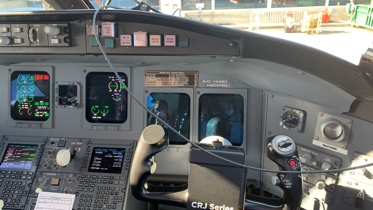 Sitting in the cockpit of an airliner.