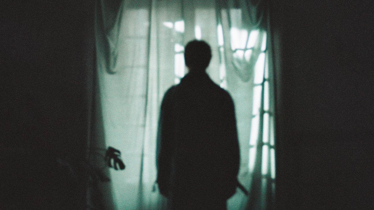 in the darkened rooms