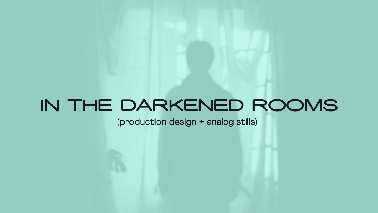 in the darkened rooms