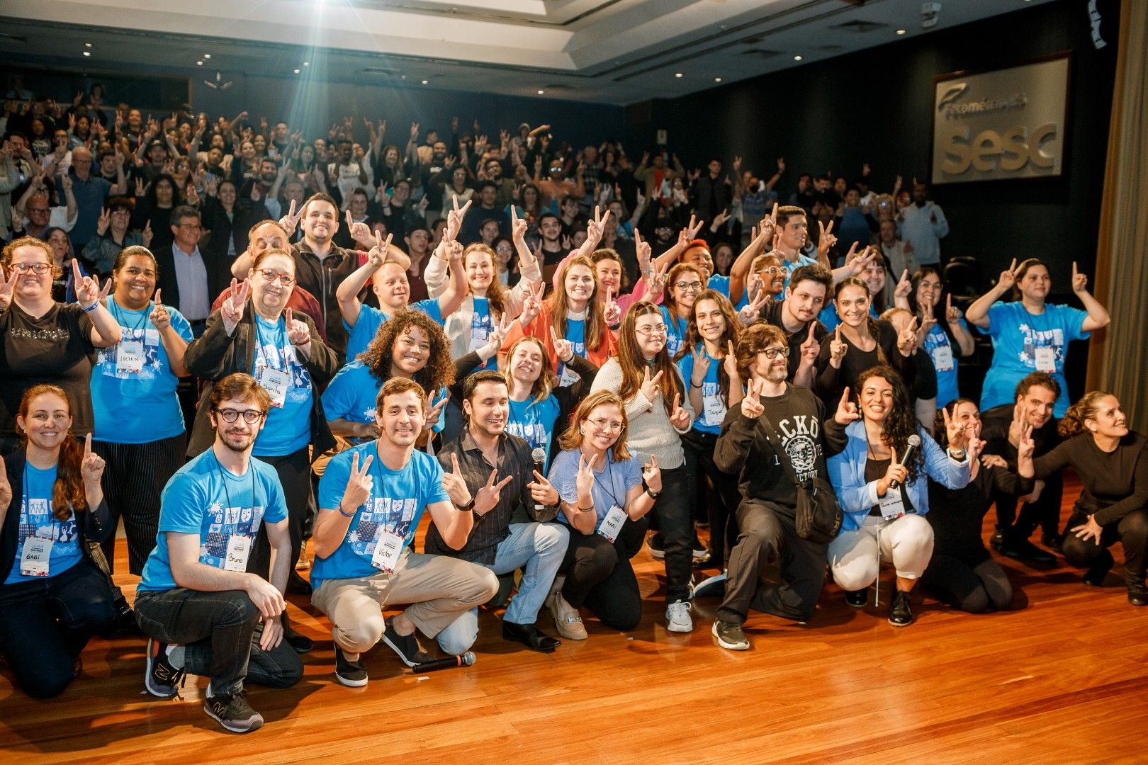 Plateia reunida em um evento do Pertence.