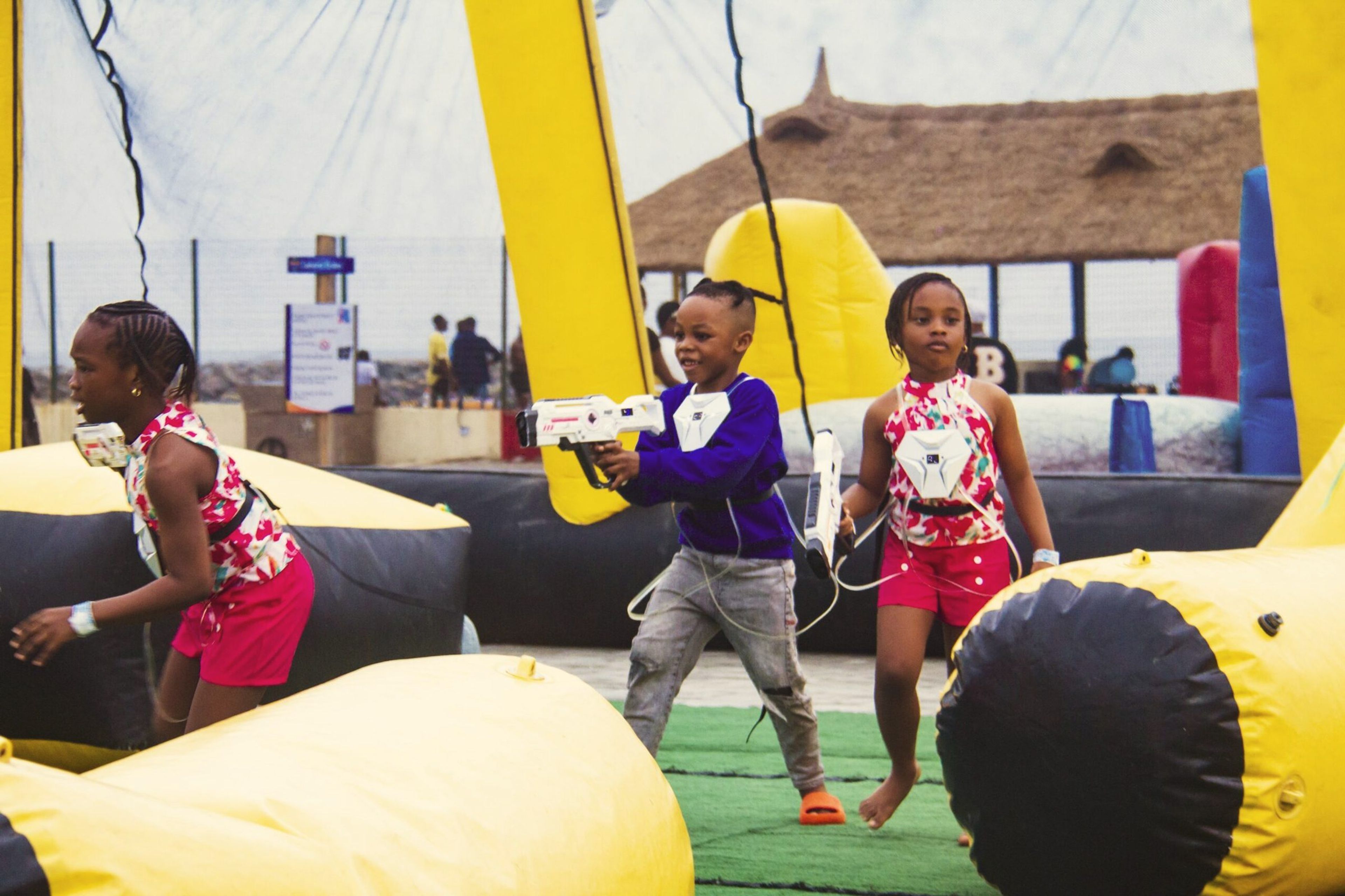 Children playing in the family park at Wave Beach