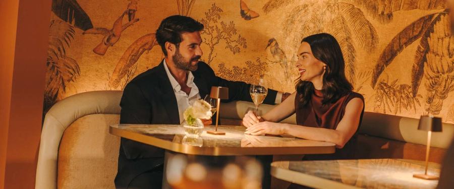 A couple at a candlelit table