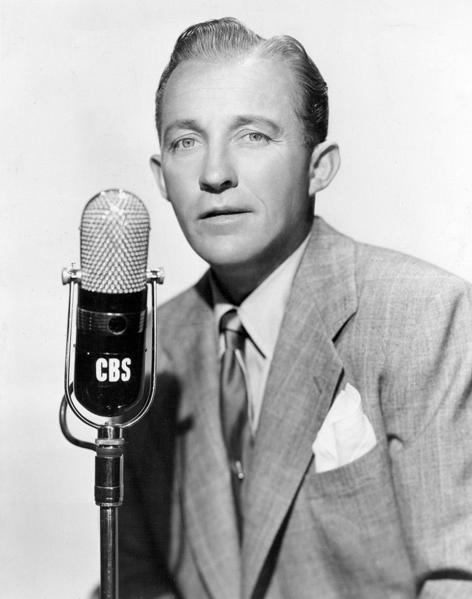 Portrait of Bing Crosby at a microphone