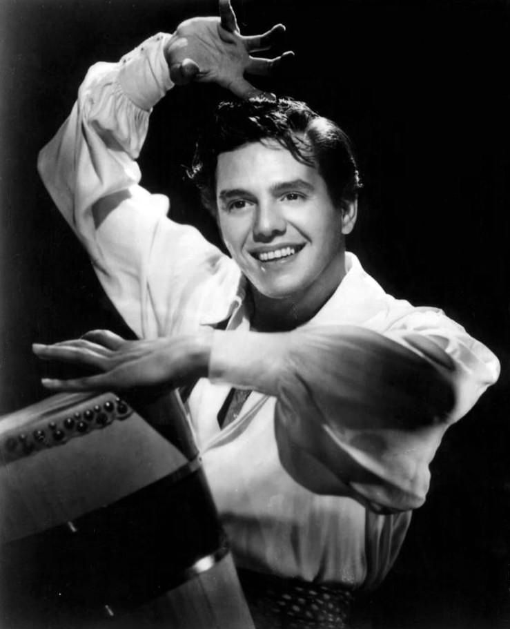 Black and white publicity portrait of bandleader Desi Arnaz