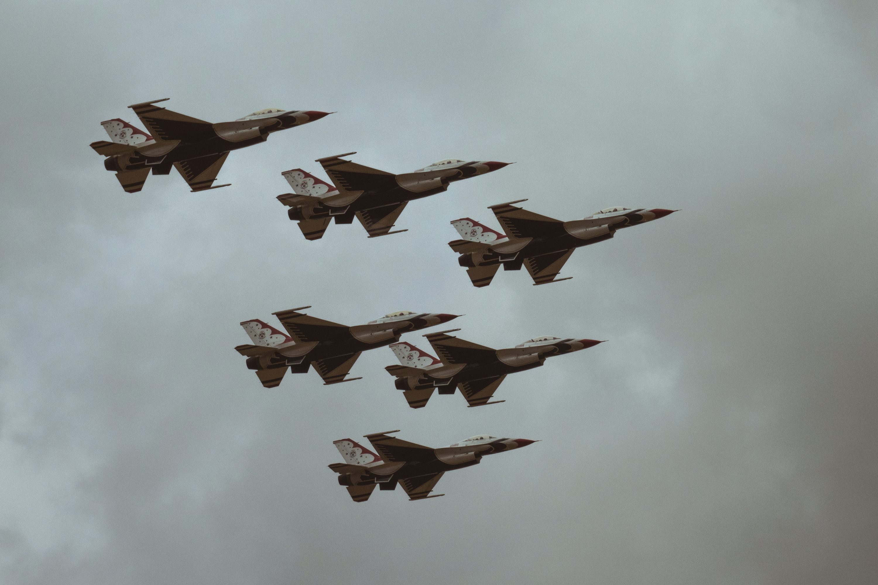Formation of military fighter jets captured in flight