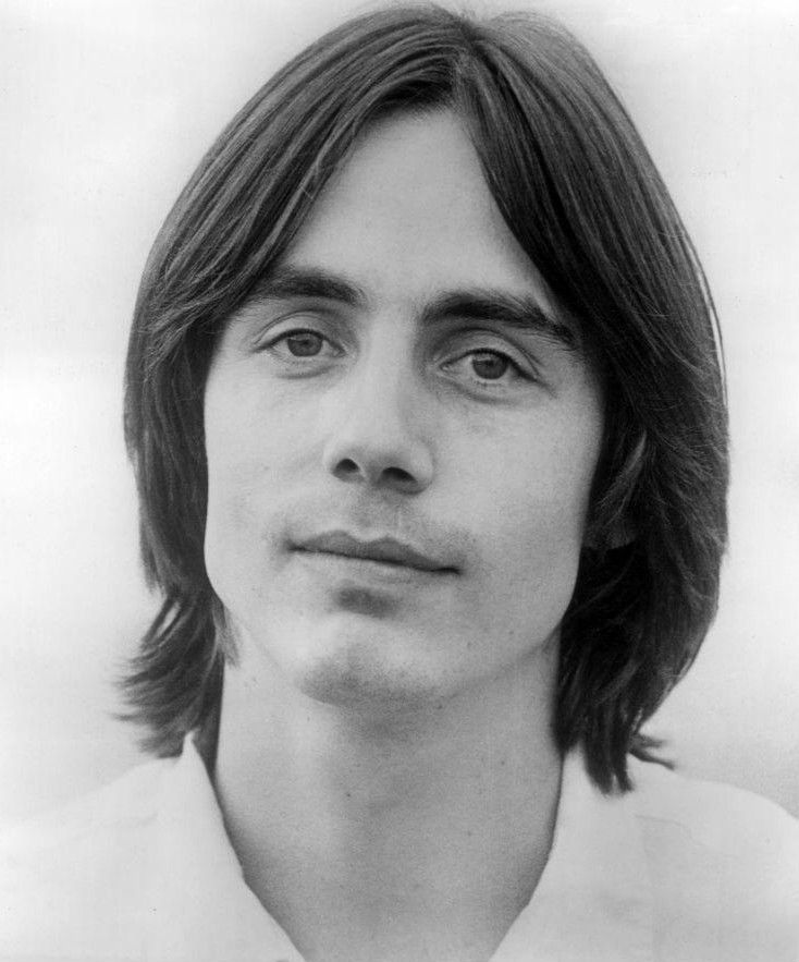 A black and white portrait of musician Jackson Brown