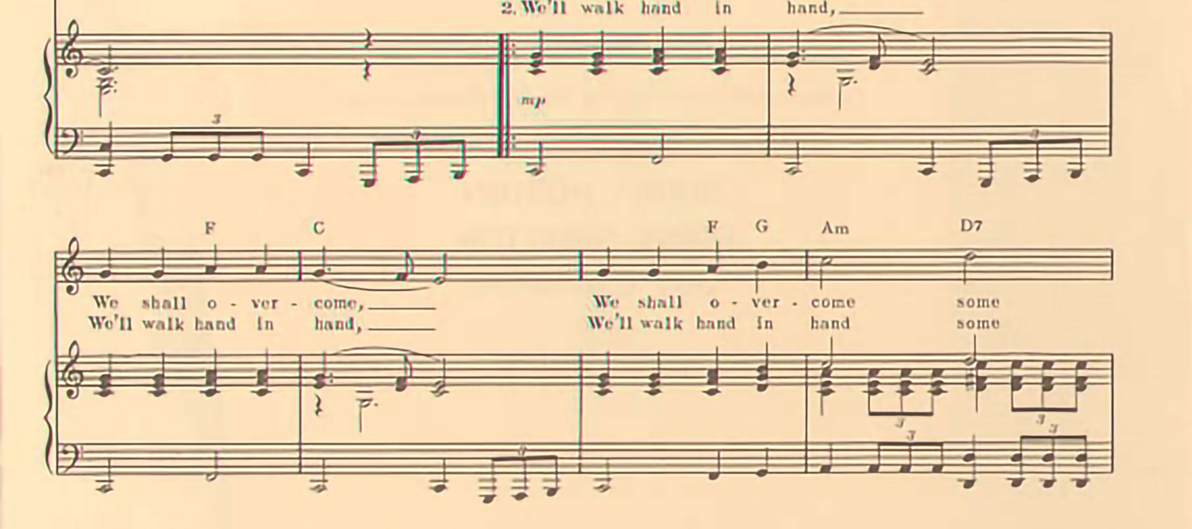 Music sheet for lyrics and musical notes for "We Shall Overcome"