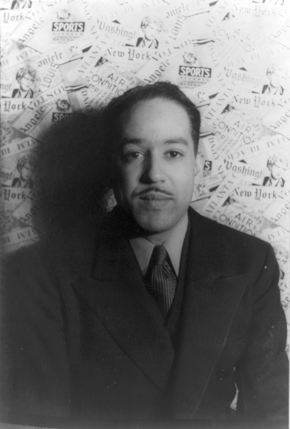 Portrait photograph of poet Langston Hughes