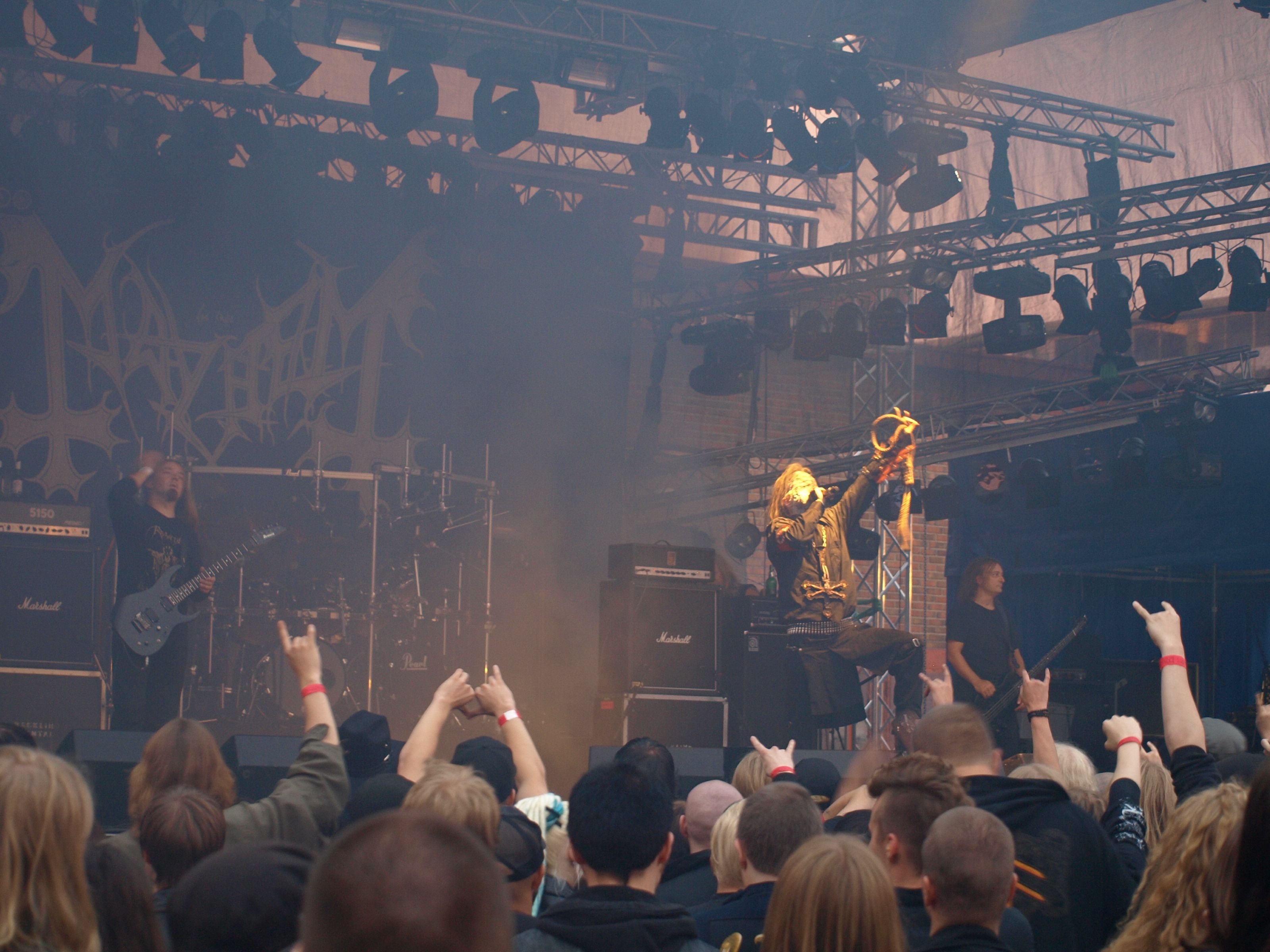 Members of the black metal band Mayhem performing live on stage in 2008