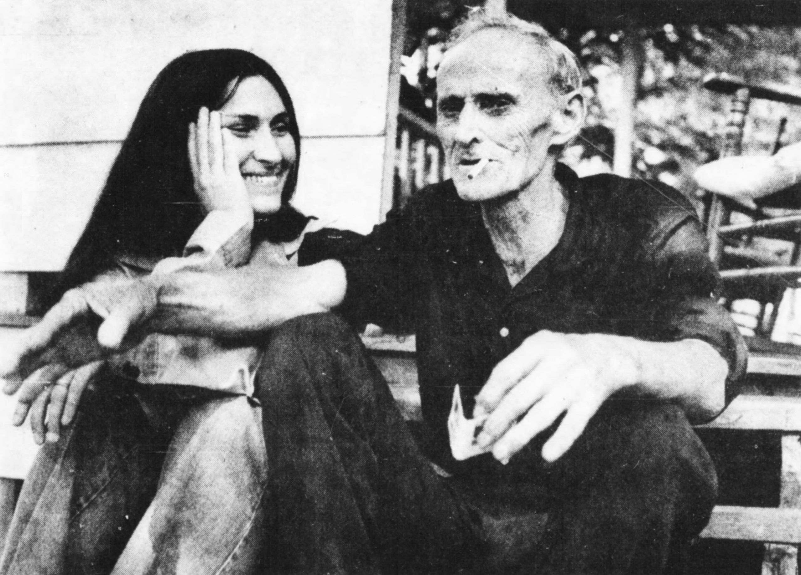 Older man (Nimrod Workman) seated beside his daughter Phyllis, 1973 newspaper photo.