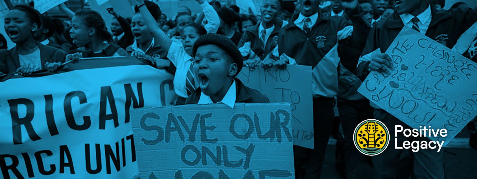 Kids in Africa protesting environmental protections while holdings signs
