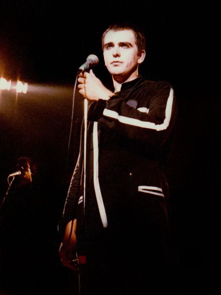 Peter Gabriel performing on stage in 1980.