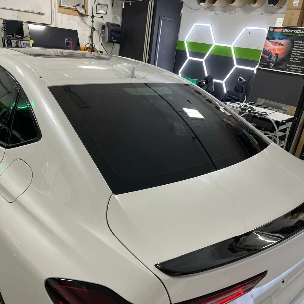 Window Tinting White Sedan — professional auto detailing work completed at Fresh Auto Spa in Port Chester, NY