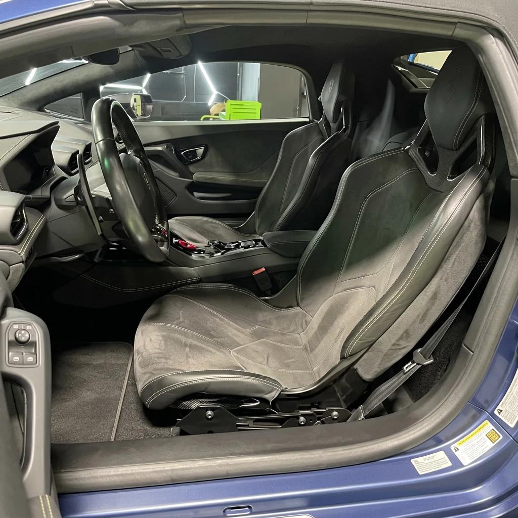 Interior Detailing Black Front Seat — professional auto detailing work completed at Fresh Auto Spa in Port Chester, NY