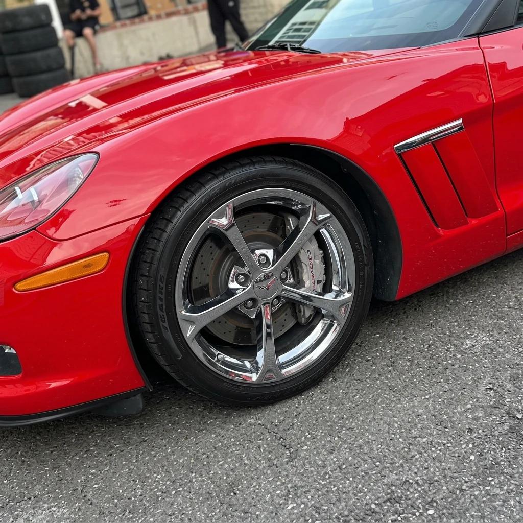 Wheel Detailing Red Sports Car — professional auto detailing work completed at Fresh Auto Spa in Port Chester, NY